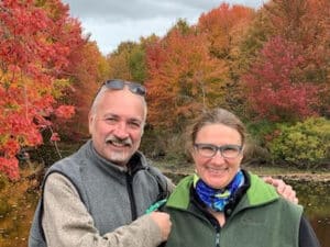 Man and woman surrounded by maples